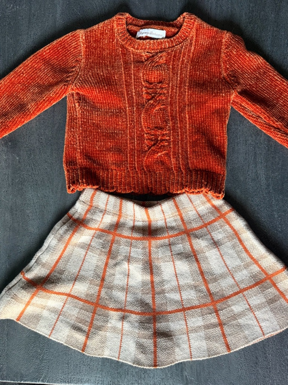 Tommy Bahama Kids Rust Orange Velvet Cable-Knit Sweater and plaid skirt